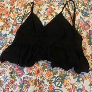 black ruffled tank top